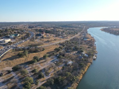 An aerial shot of the lake marble falls reservoir during the day in Texas